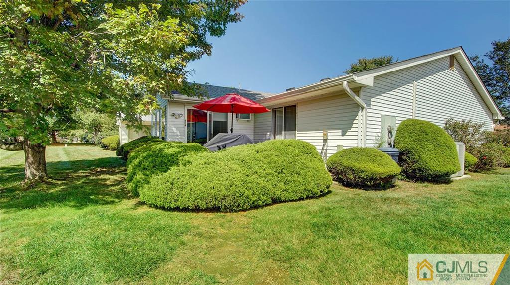 801 A Pompton Road, Unit 801A Monroe Township, NJ 08831 - Photo 26 of 33 a view of a house with a backyard