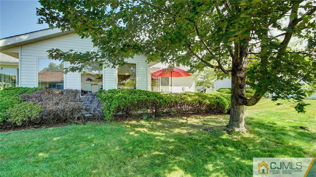 801 A Pompton Road, Unit 801A Monroe Township, NJ 08831 - Photo 27 of 33 a front view of a house with garden