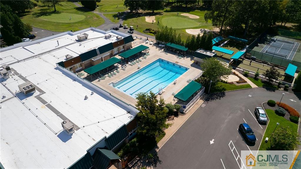 801 A Pompton Road, Unit 801A Monroe Township, NJ 08831 - Photo 33 of 33 an aerial view of a house with a garden and swimming pool