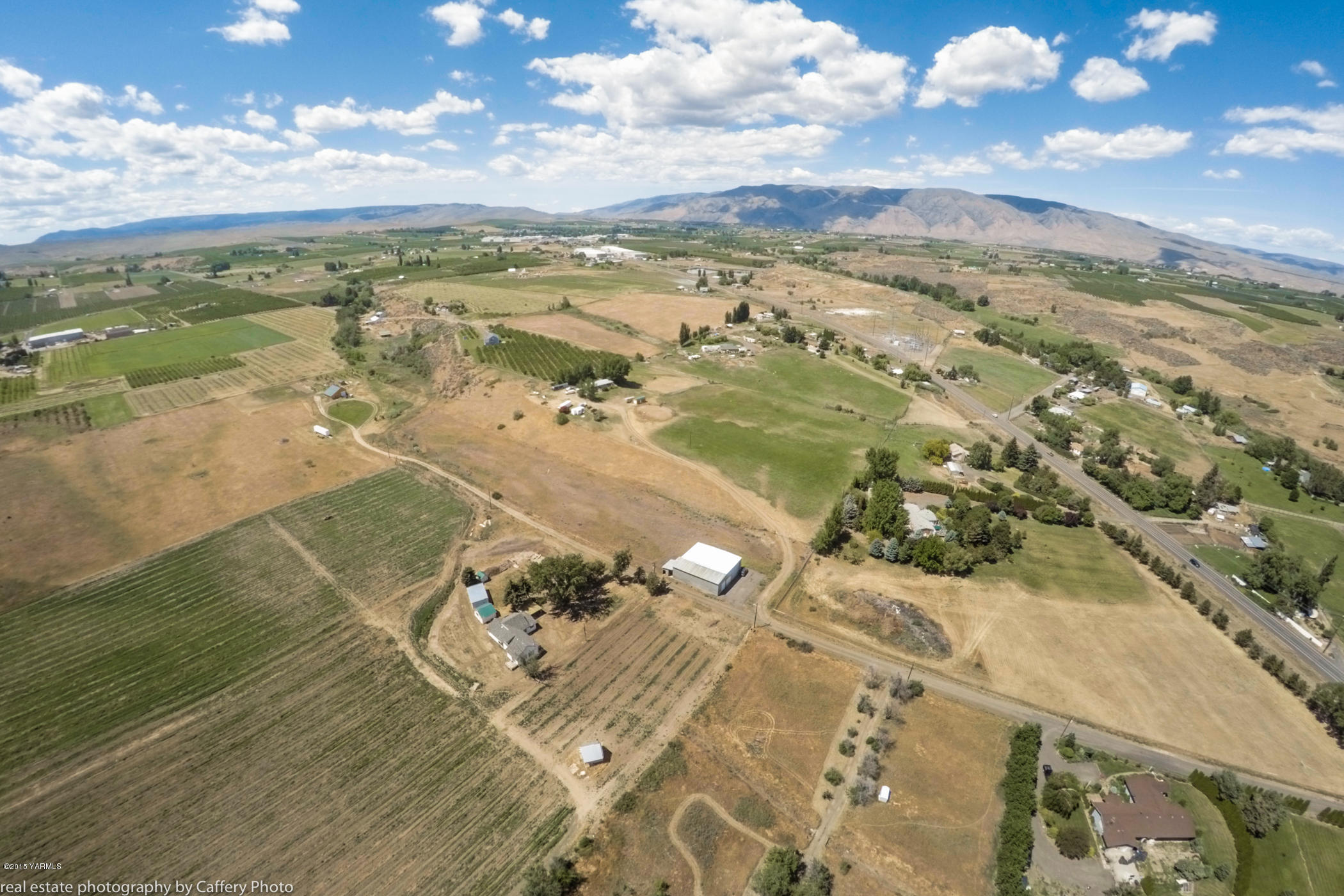 252-250 Knutson Road Tieton, WA 98947 - Photo 50 of 51 an aerial view of a residential houses with outdoor space
