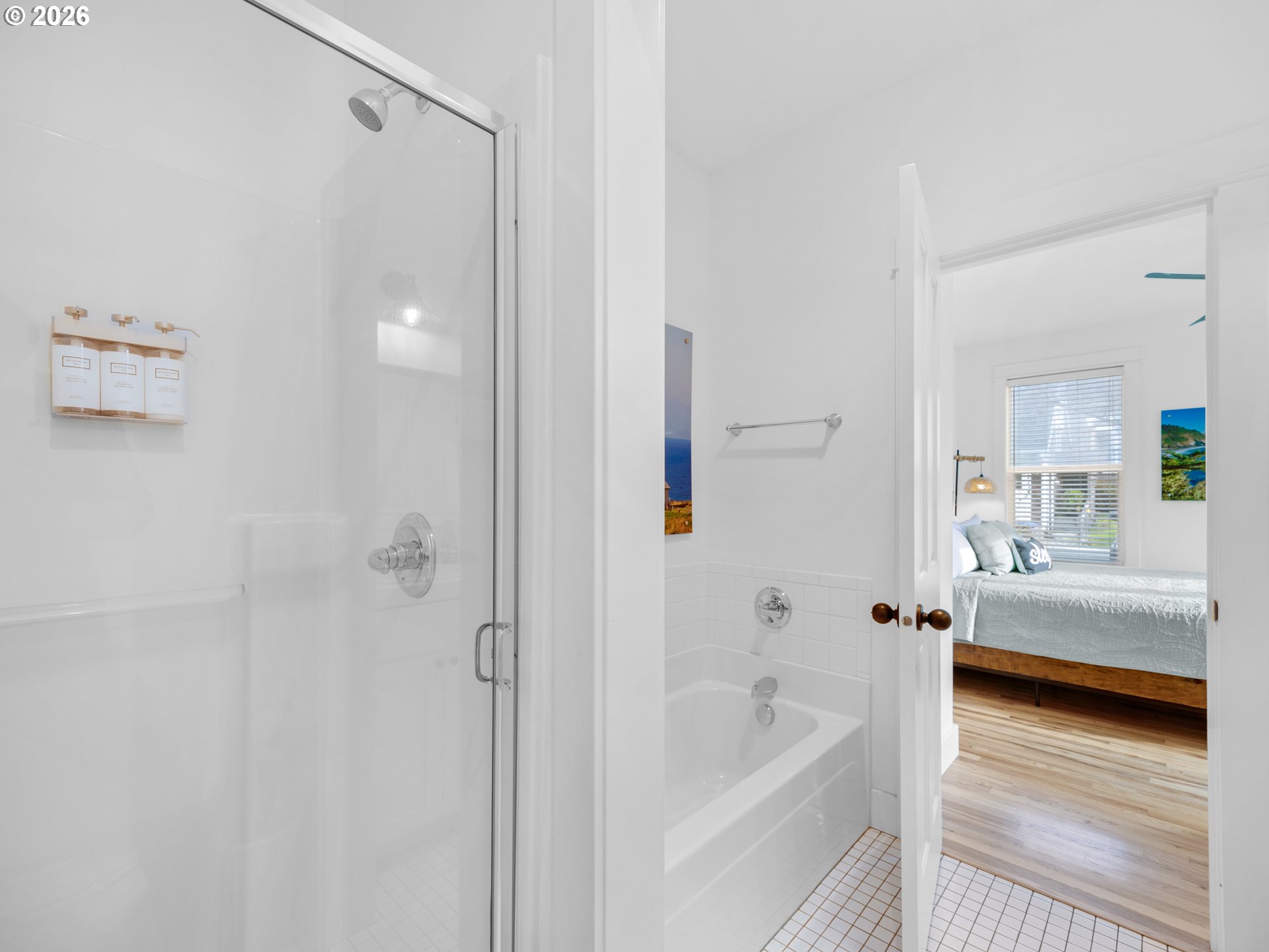 2746 Southwest Barnacle Avenue Lincoln City, OR 97367 - Photo 17 of 48 a bathroom with a tub shower vanity and a sink