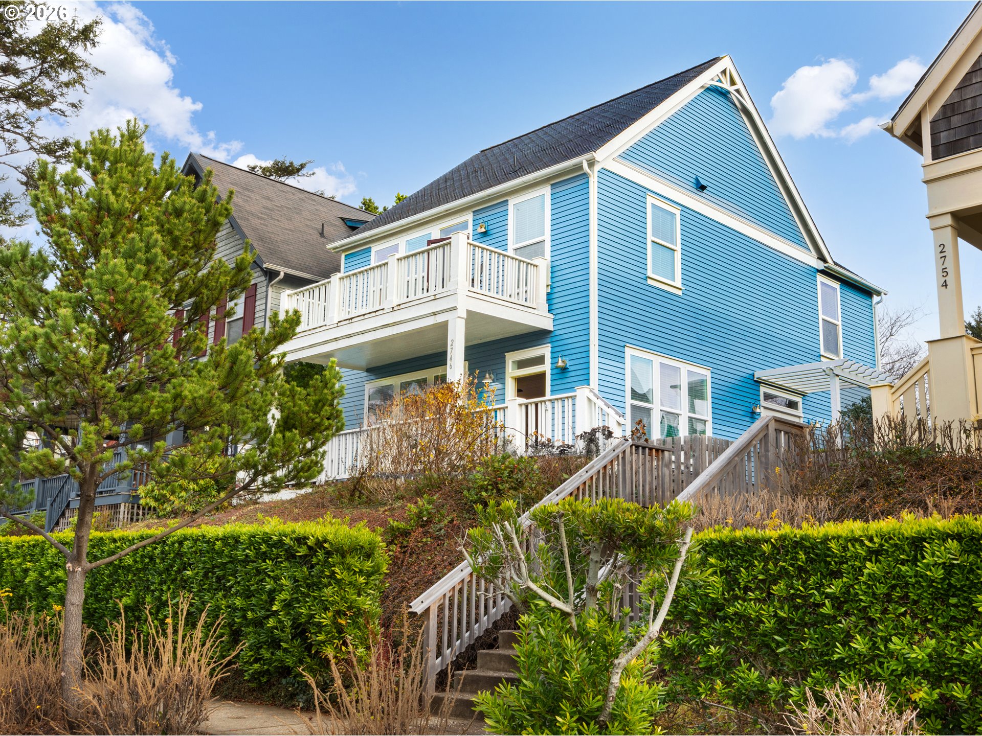 2746 Southwest Barnacle Avenue Lincoln City, OR 97367 - Photo 2 of 48 a front view of a house with garden