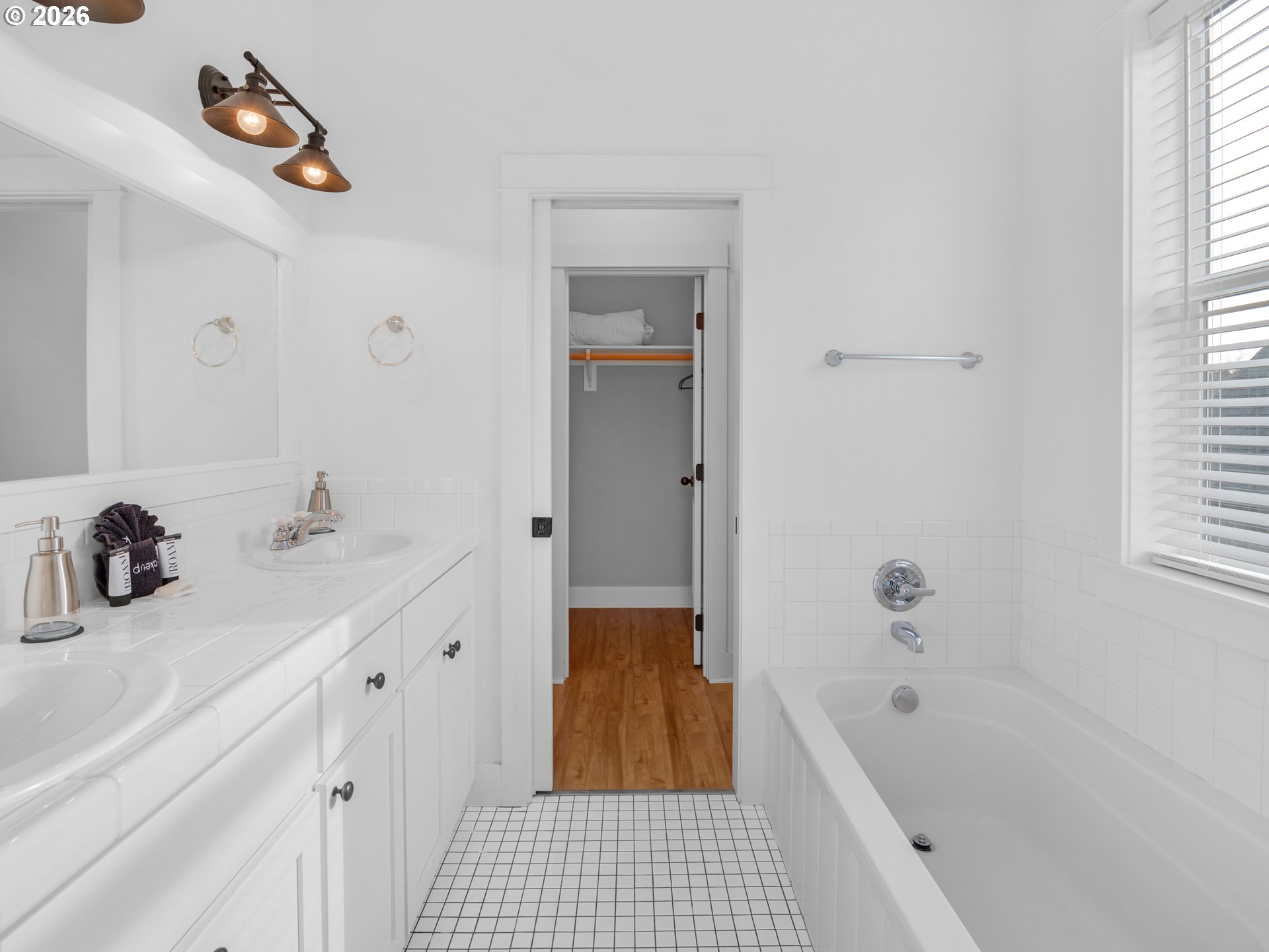 2746 Southwest Barnacle Avenue Lincoln City, OR 97367 - Photo 22 of 48 a bathroom with a tub sink and a mirror