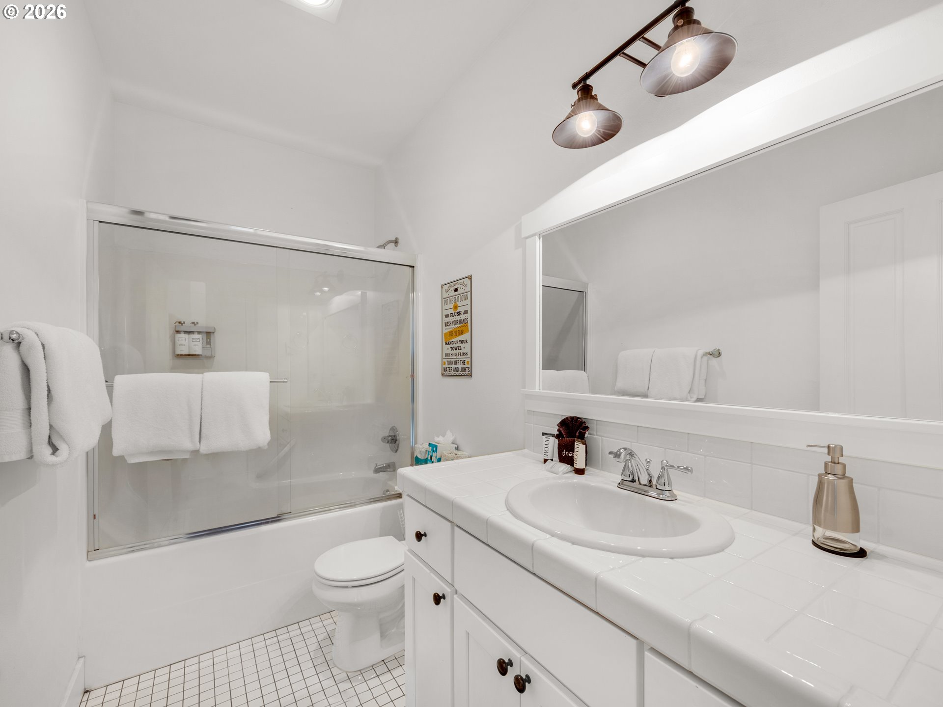 2746 Southwest Barnacle Avenue Lincoln City, OR 97367 - Photo 28 of 48 a bathroom with a sink toilet and shower