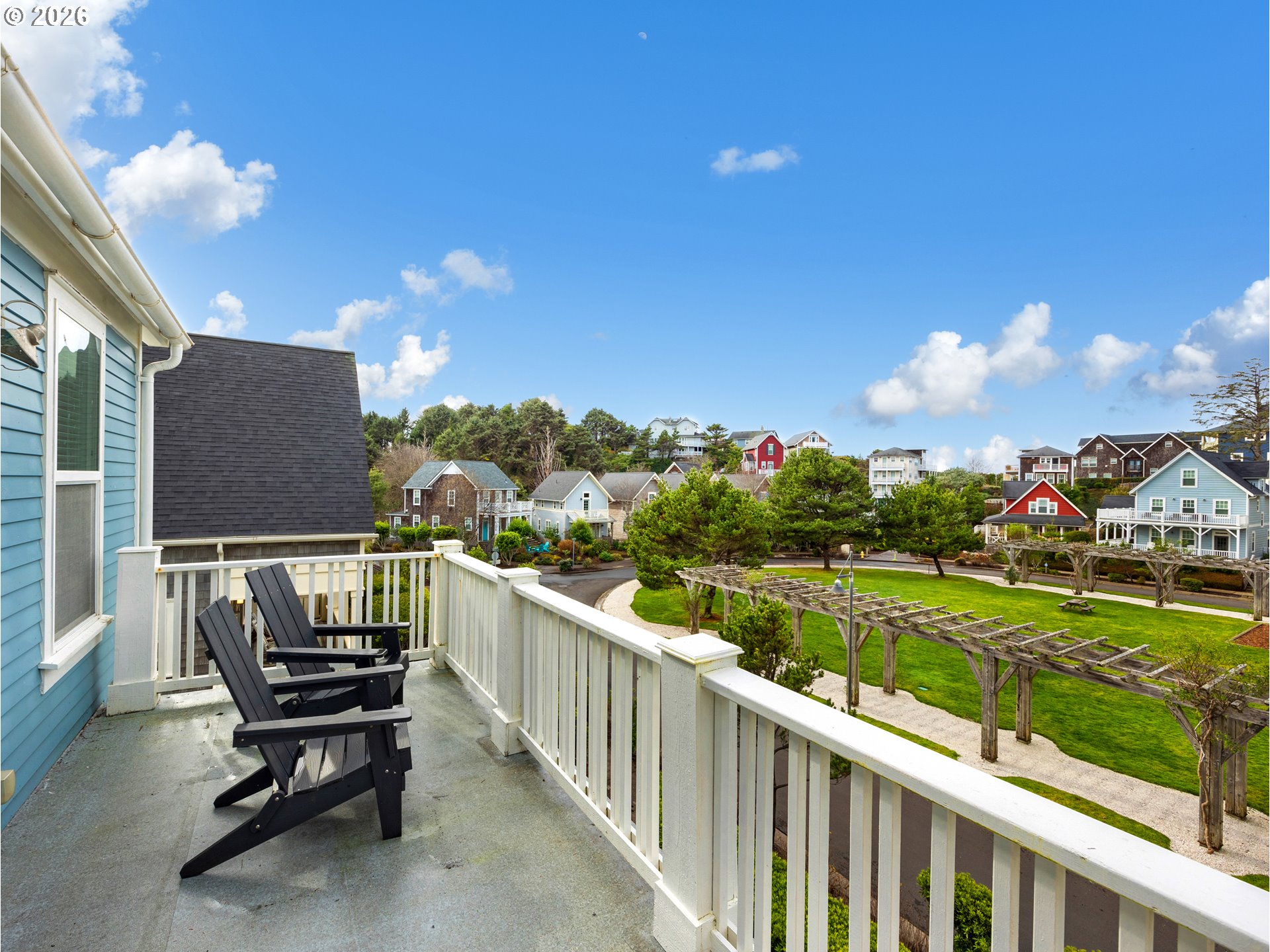 2746 Southwest Barnacle Avenue Lincoln City, OR 97367 - Photo 37 of 48 a view of a deck with a table and chairs