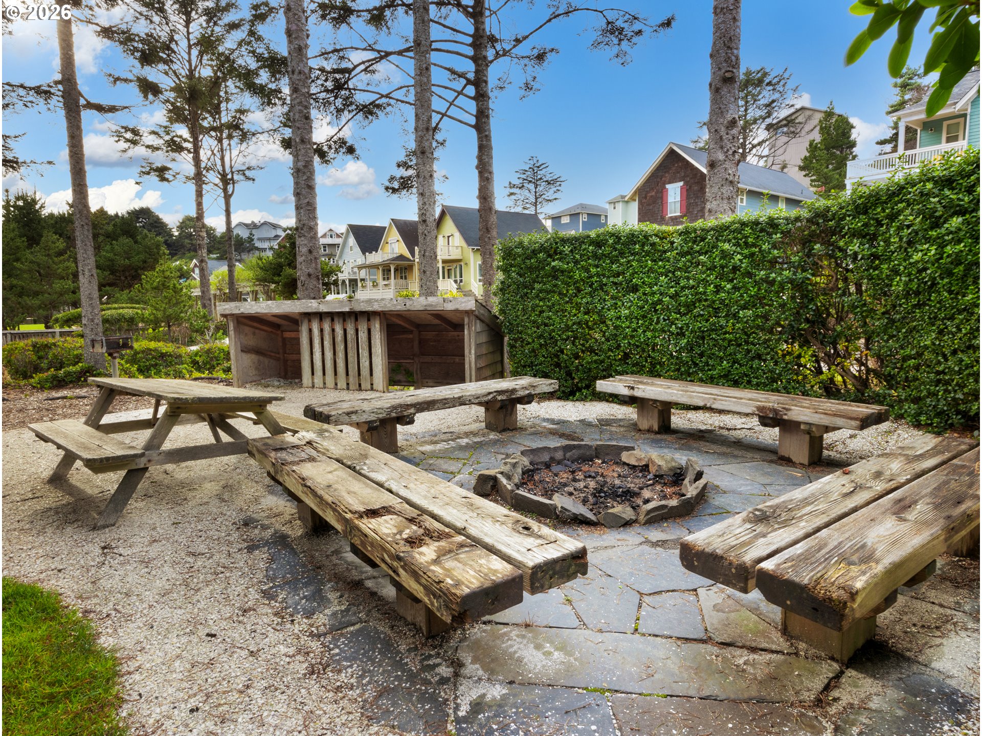 2746 Southwest Barnacle Avenue Lincoln City, OR 97367 - Photo 41 of 48 a view of a chairs and fire pit in the patio