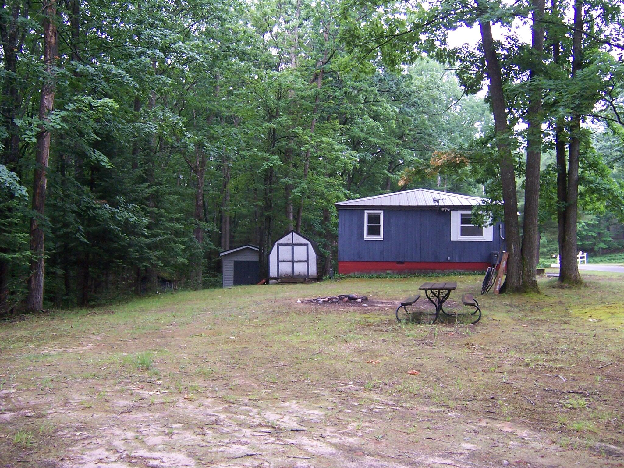 409 Marvin Road Roscommon, MI 48653 - Photo 17 of 29 Huge Side Yard