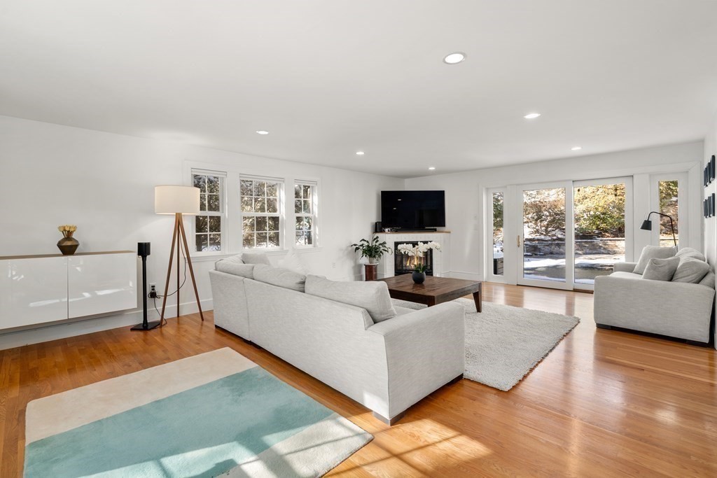448 Quinobequin Road Newton, MA 02468 - Photo 13 of 35 a living room with furniture and a flat screen tv