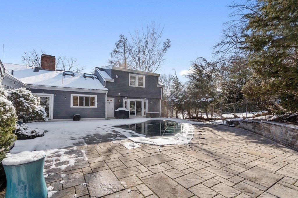 448 Quinobequin Road Newton, MA 02468 - Photo 35 of 35 a front view of a house with a yard