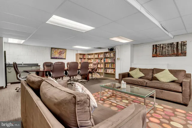 a living room with furniture and a couch