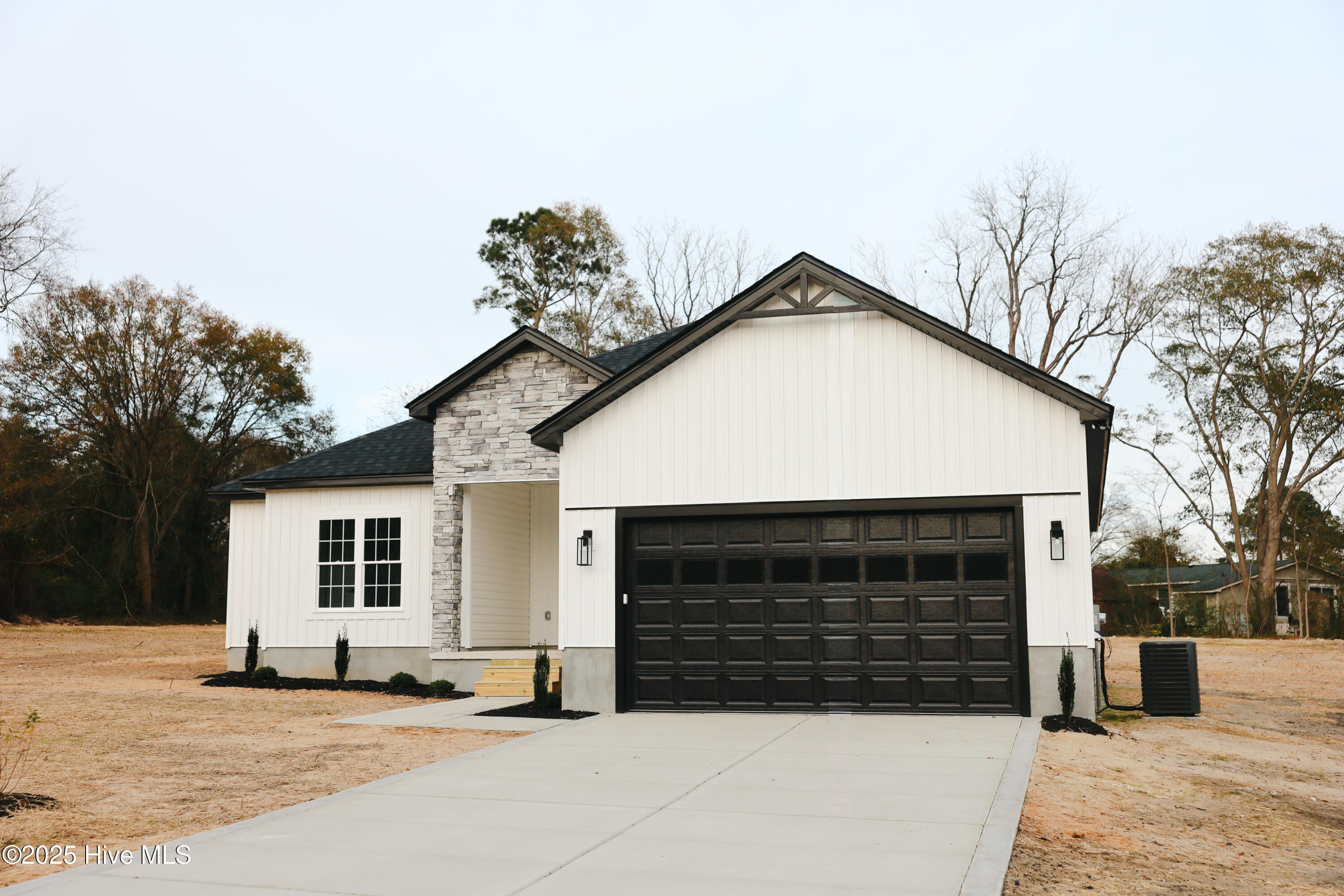 578 Forest Knolls Road Goldsboro, NC 27534 - Photo 21 of 22 Black Garage door