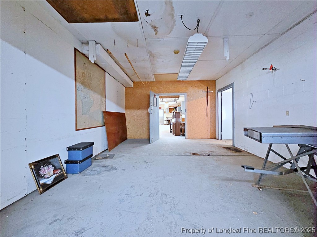 764 Old Vander Road Fayetteville, NC 28312 - Photo 45 of 50 a big room with chandelier fan and windows