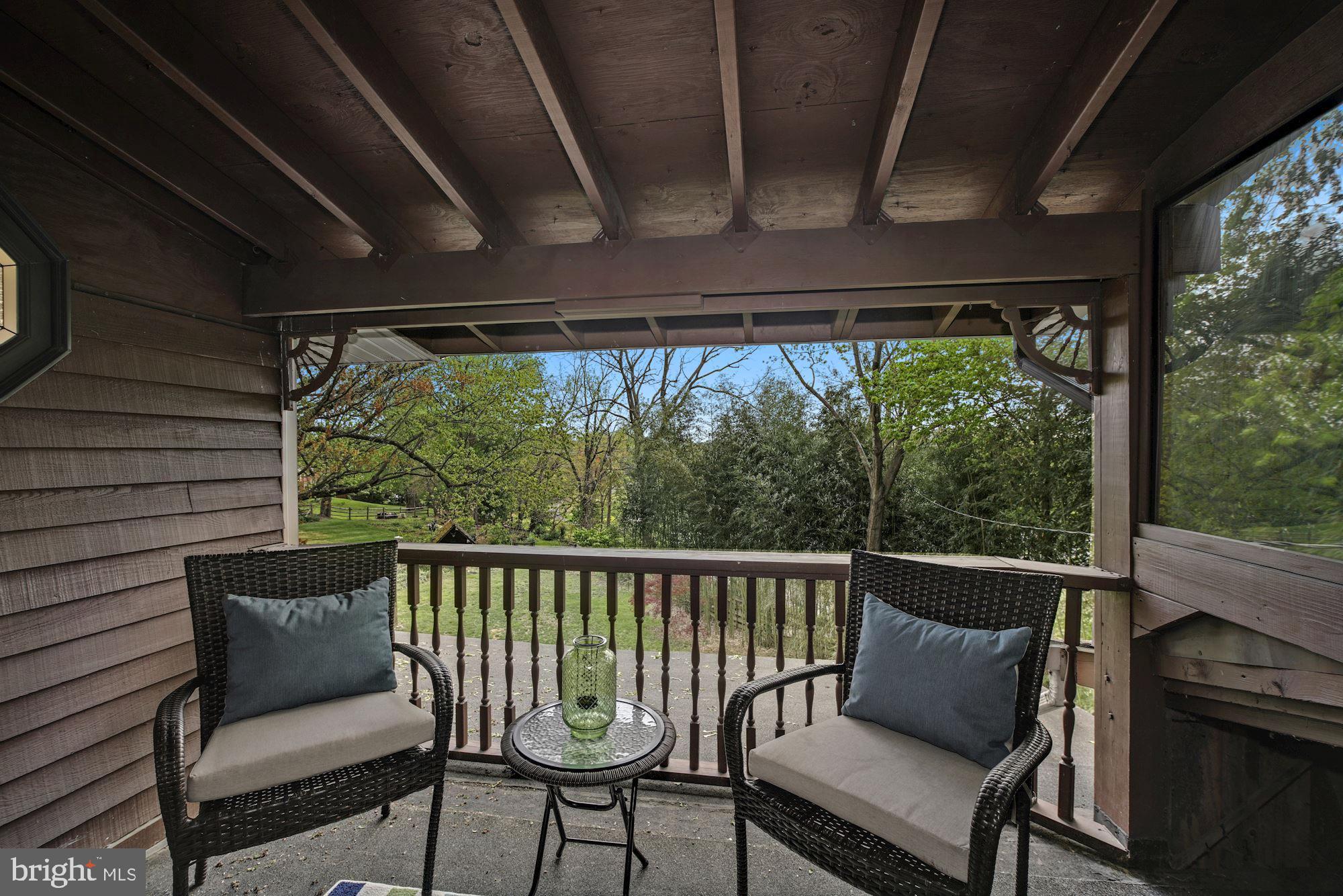 7036 Warfield Road Gaithersburg, MD 20882 - Photo 16 of 30 Covered Balcony Offers View of the Backyard