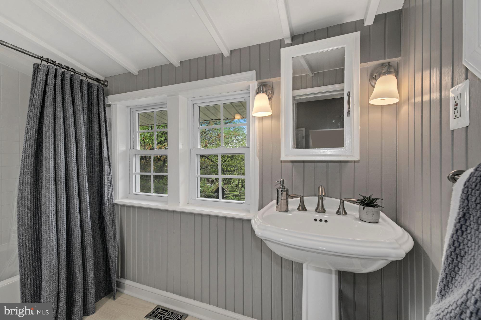 7036 Warfield Road Gaithersburg, MD 20882 - Photo 17 of 30 And En Suite Bathroom Has Windows on Three Sides