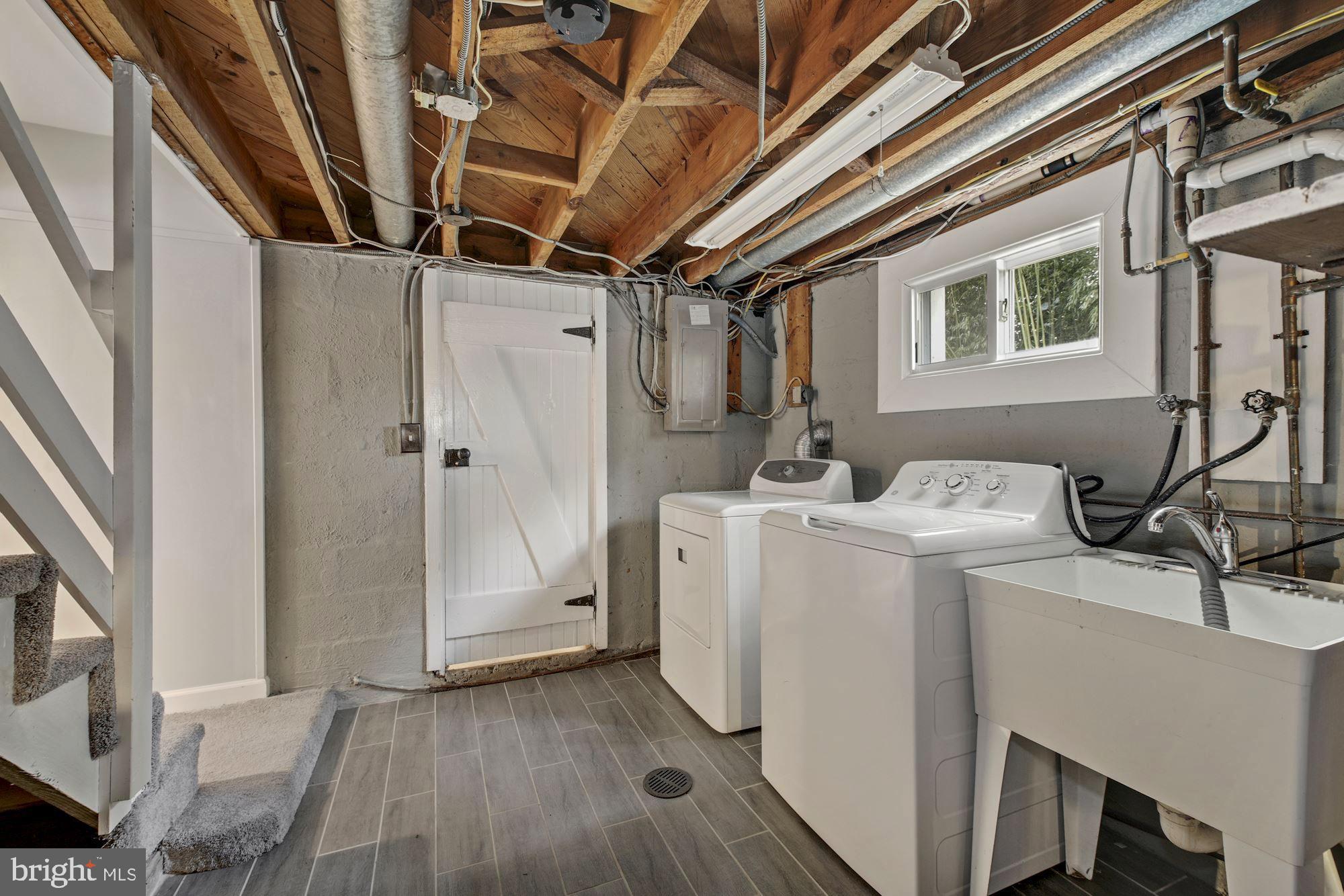 7036 Warfield Road Gaithersburg, MD 20882 - Photo 25 of 30 Laundry and Lots of Storage (Not Pictured)