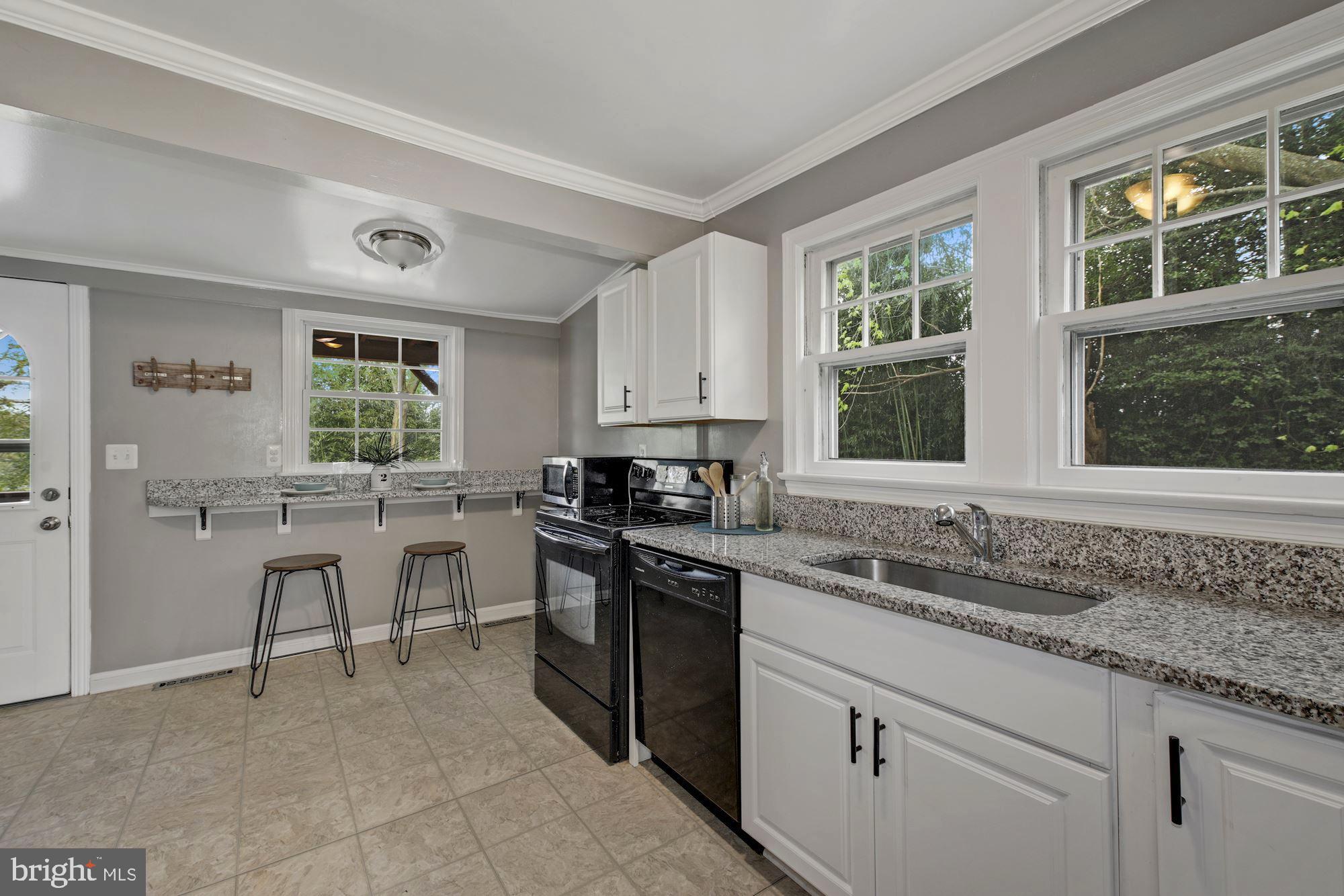 7036 Warfield Road Gaithersburg, MD 20882 - Photo 8 of 30 Large Kitchen with Granite Countertops