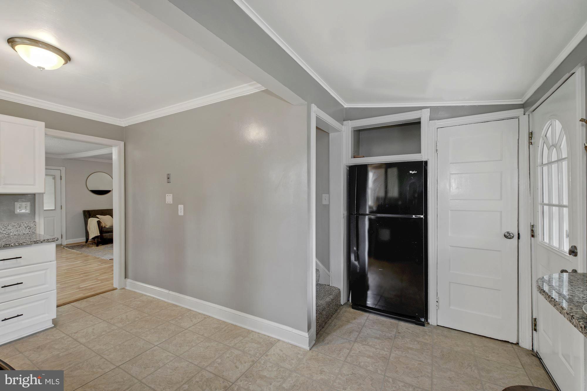 7036 Warfield Road Gaithersburg, MD 20882 - Photo 10 of 30 With Fridge and Pantry Tucked Away