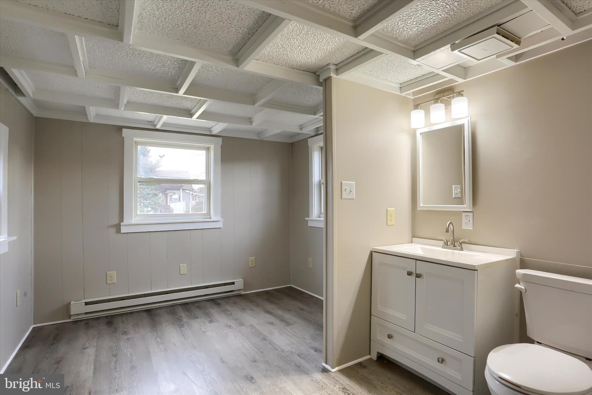 1963 Sheaffer Road Elizabethtown, PA 17022 - Photo 24 of 29 a bathroom with a toilet sink and mirror