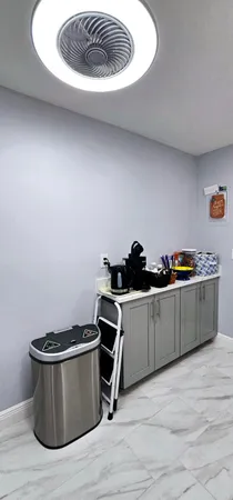a room with wooden cabinets