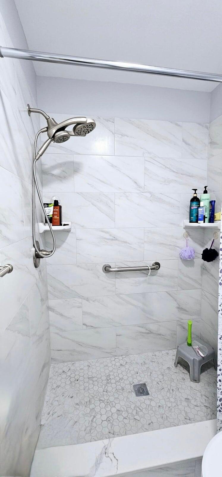 10126 South 44th Terrace Boynton Beach, FL 33436 - Photo 19 of 30 a bathroom with a shower