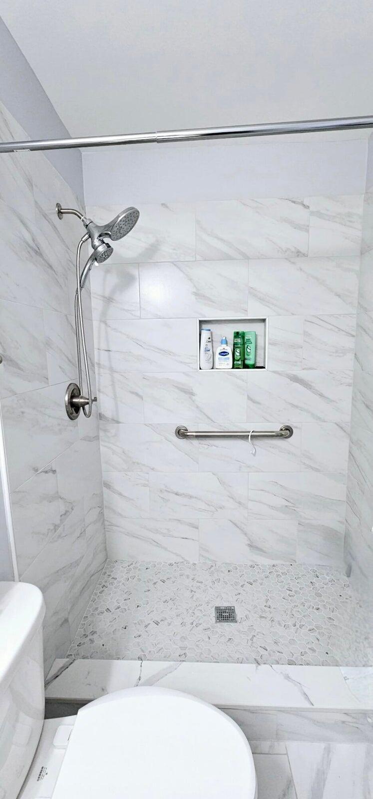 10126 South 44th Terrace Boynton Beach, FL 33436 - Photo 25 of 30 a bathroom with a shower