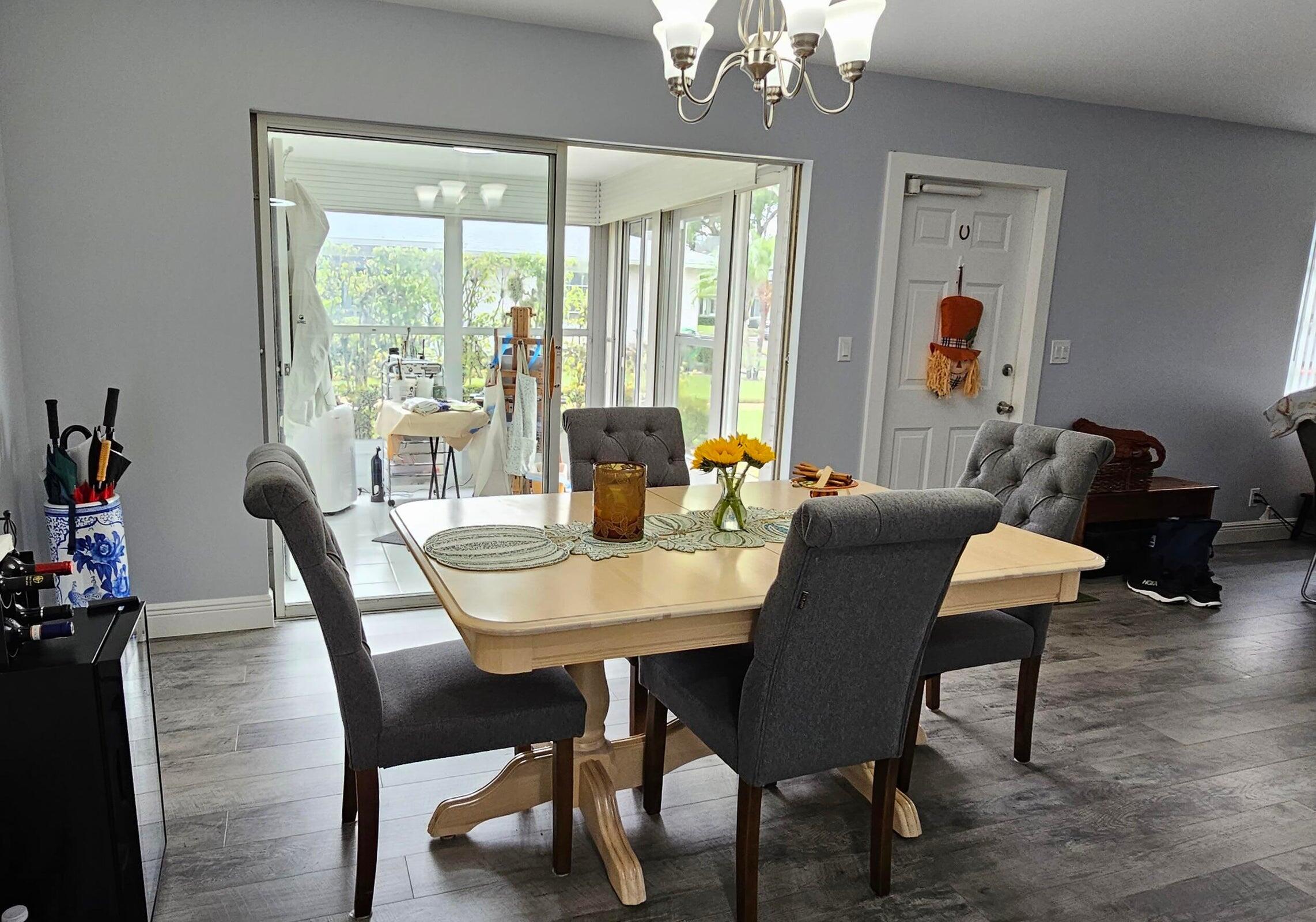 10126 South 44th Terrace Boynton Beach, FL 33436 - Photo 3 of 30 a view of a dining room with furniture window and outside view
