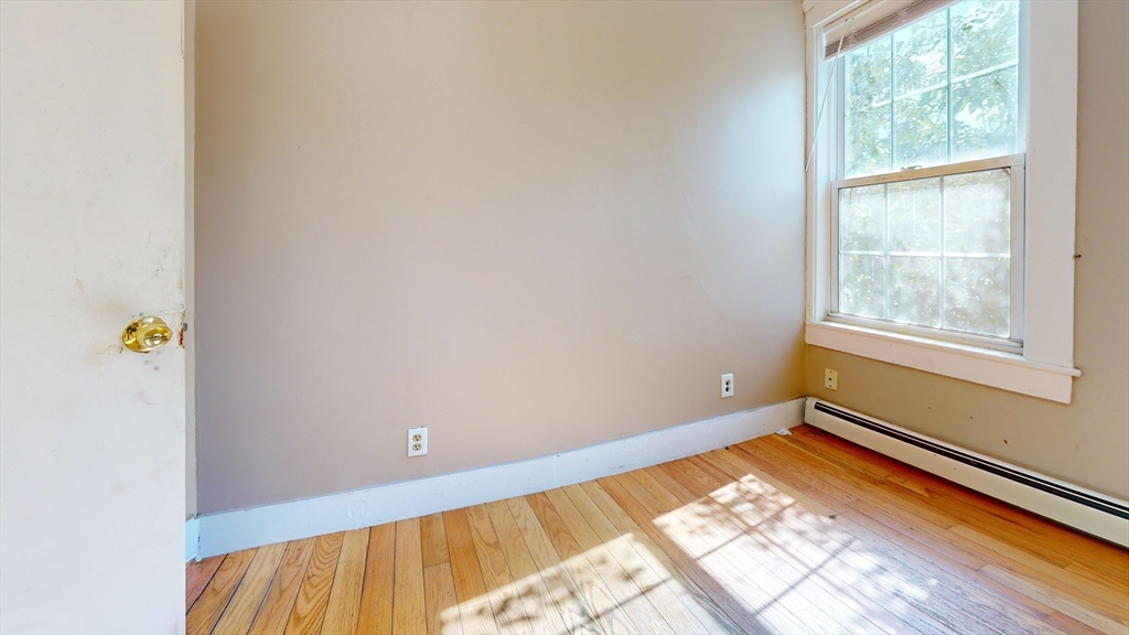 1022 Main Street Worcester, MA 01603 - Photo 25 of 40 a view of an empty room and window