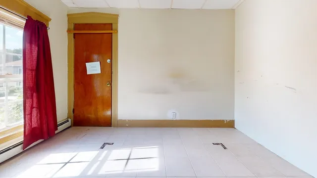 a view of a hallway with closet