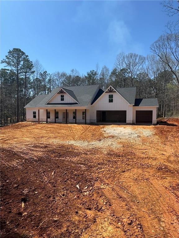 3300 Holly Springs Road Rockmart, GA 30153 - Photo 1 of 38 a front view of house with a garden