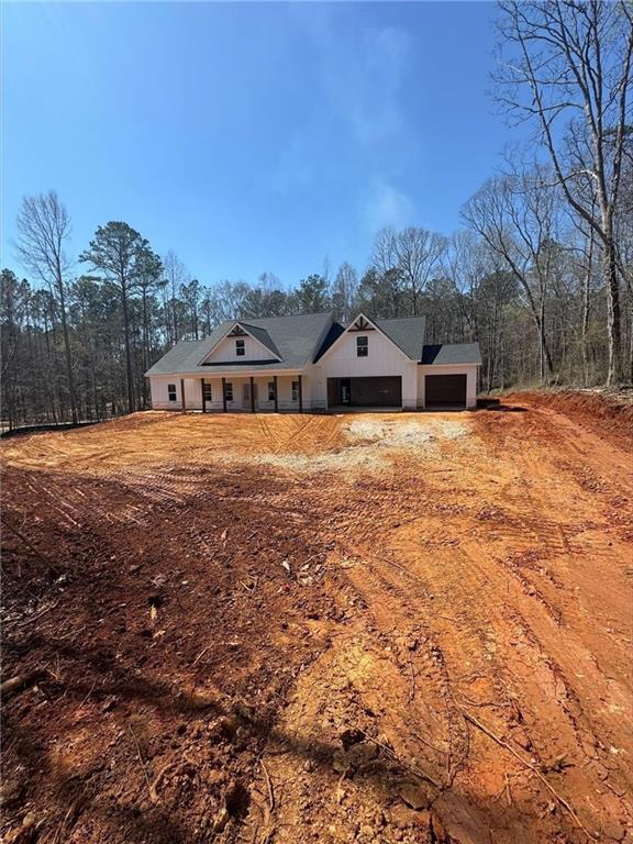 3300 Holly Springs Road Rockmart, GA 30153 - Photo 2 of 38 a view of an house with backyard and a tree
