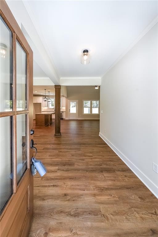 3300 Holly Springs Road Rockmart, GA 30153 - Photo 3 of 38 a view of empty room with wooden floor and fan