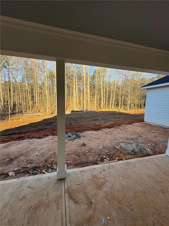 3300 Holly Springs Road Rockmart, GA 30153 - Photo 35 of 38 a view of a house with backyard and porch