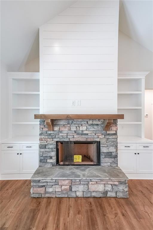 3300 Holly Springs Road Rockmart, GA 30153 - Photo 7 of 38 a view of living room with wooden floor and fireplace