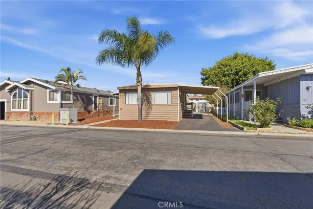 front view of a house with a garden