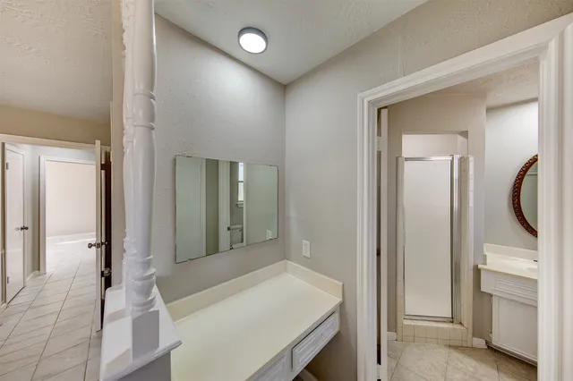 a view of a bathroom from the hallway