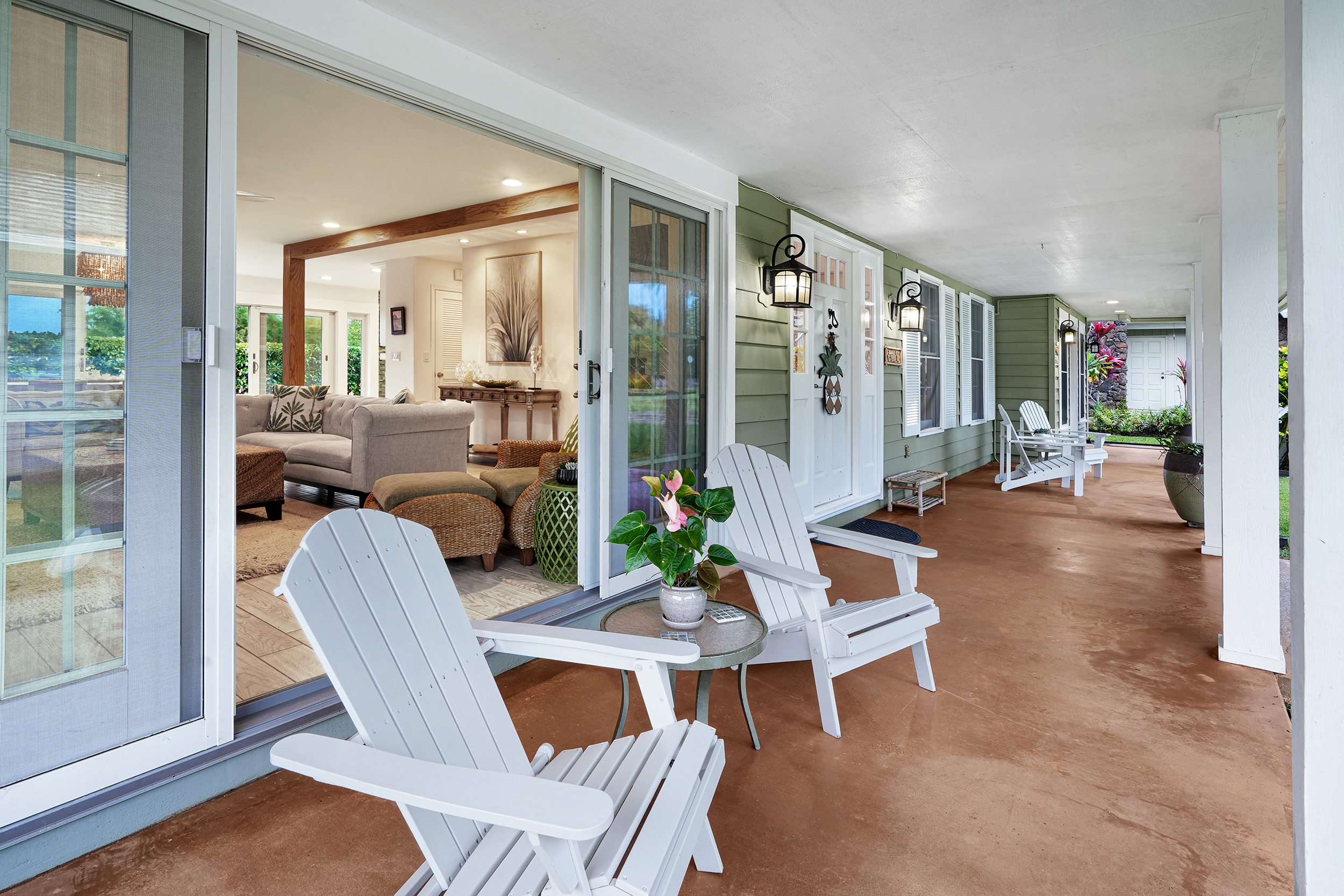 5348 Honoiki Road Princeville, HI 96722 - Photo 3 of 25 a living room with furniture and a large window