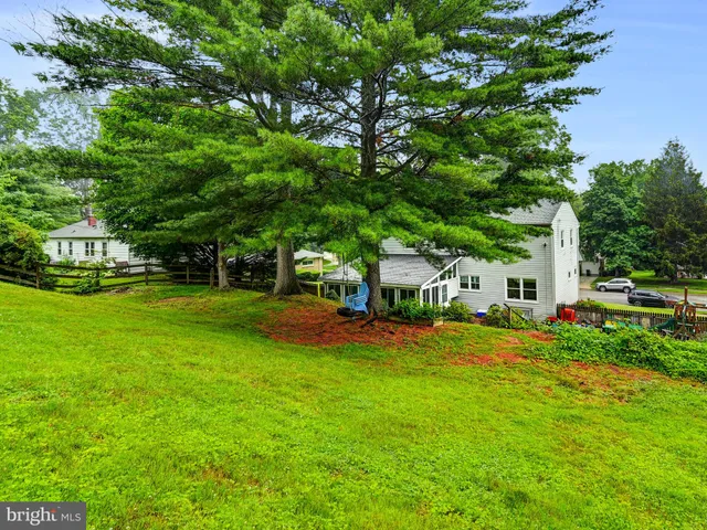 a view of a house with a big yard