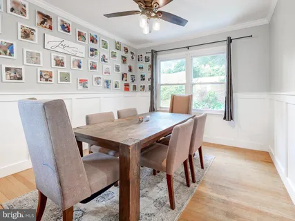 a picture of a bench in front of a wall