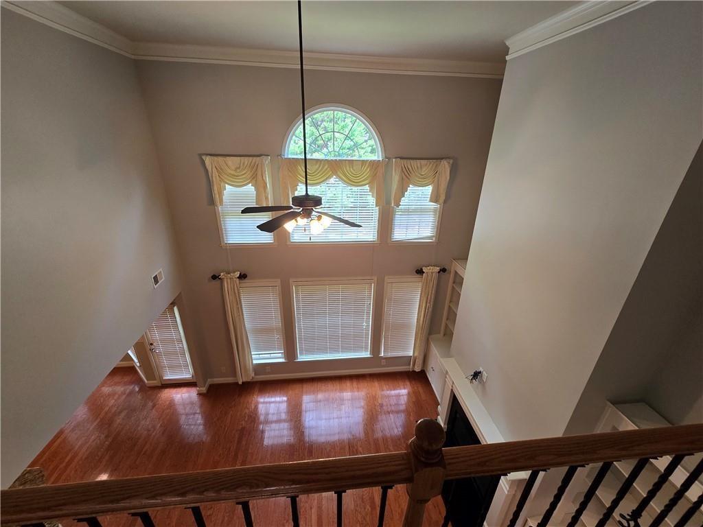 624 Maple Grove Way Marietta, GA 30066 - Photo 5 of 27 a view of a dining room with furniture window and wooden floor