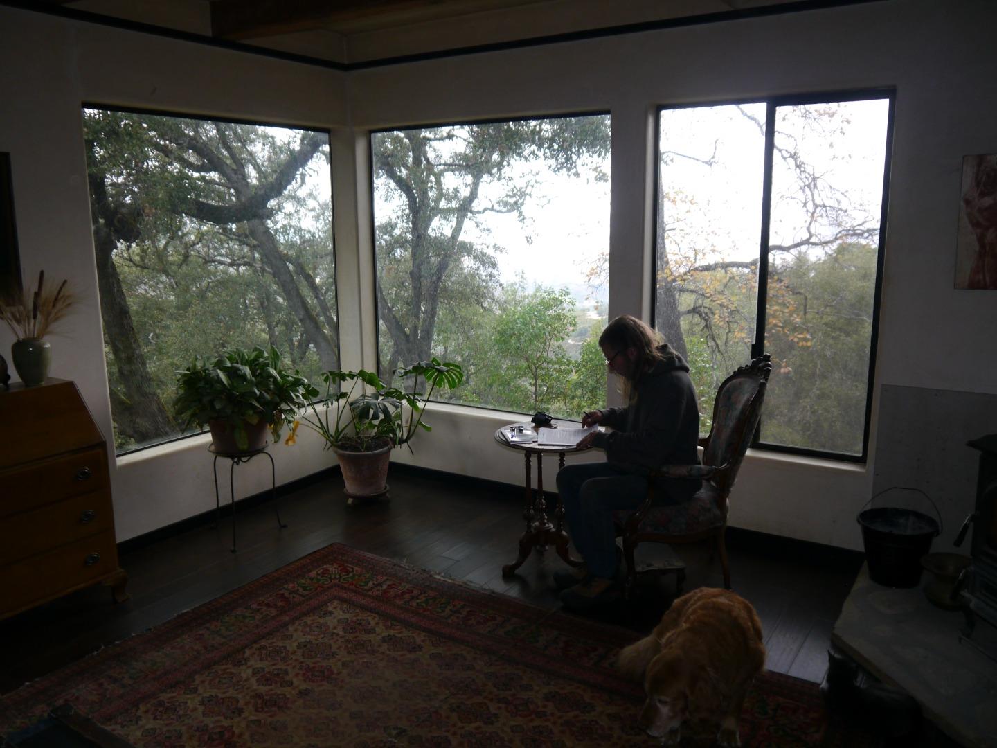 39450 Tassajara Road Carmel Valley, CA 93924 - Photo 14 of 61 a living room with furniture and a window