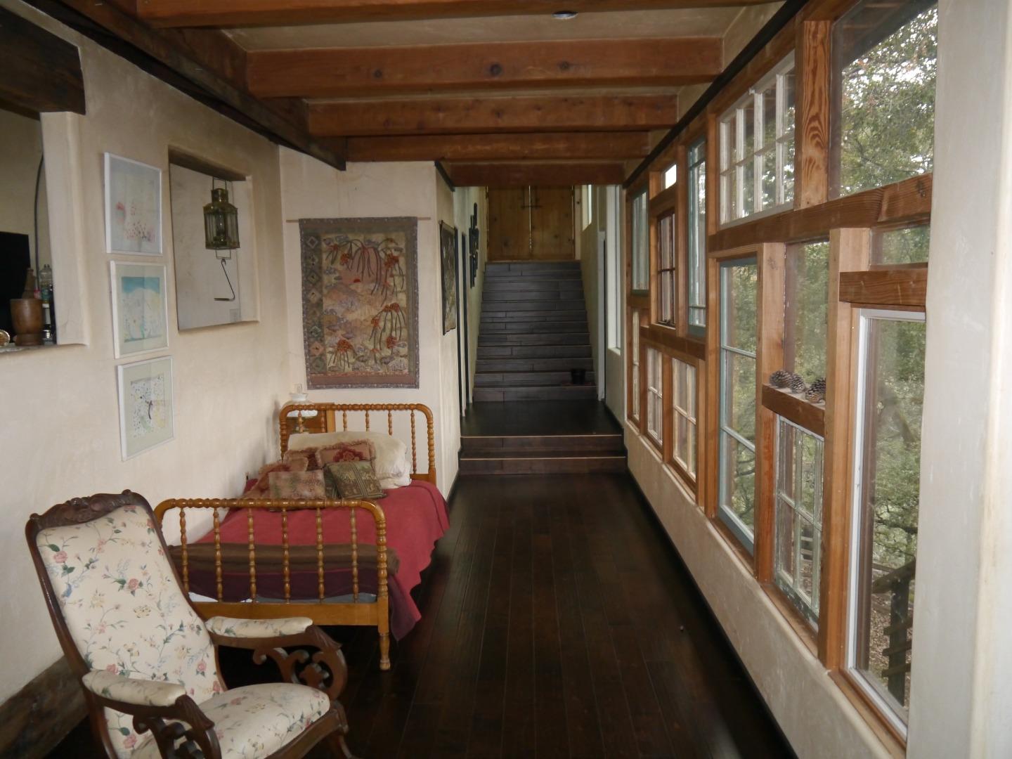 39450 Tassajara Road Carmel Valley, CA 93924 - Photo 17 of 61 a view of a hallway with seating area