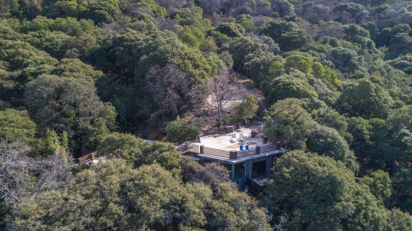 39450 Tassajara Road Carmel Valley, CA 93924 - Photo 4 of 61 aerial view of a house with a yard and large trees