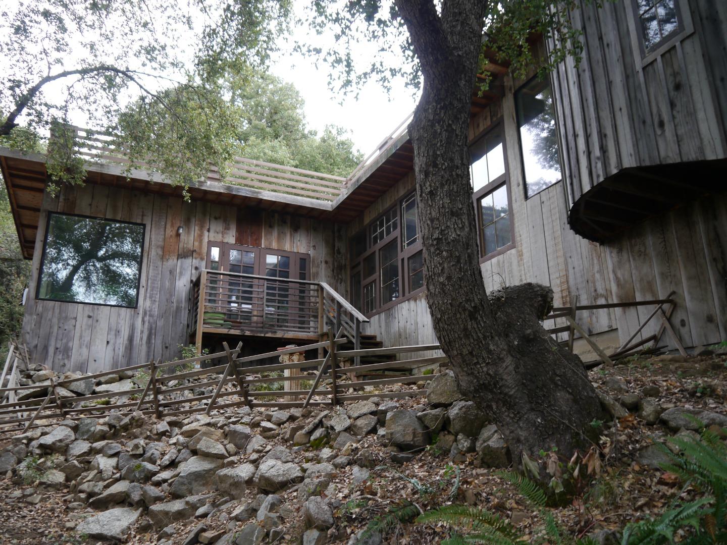 39450 Tassajara Road Carmel Valley, CA 93924 - Photo 42 of 61 a backyard of a house with lots of green space