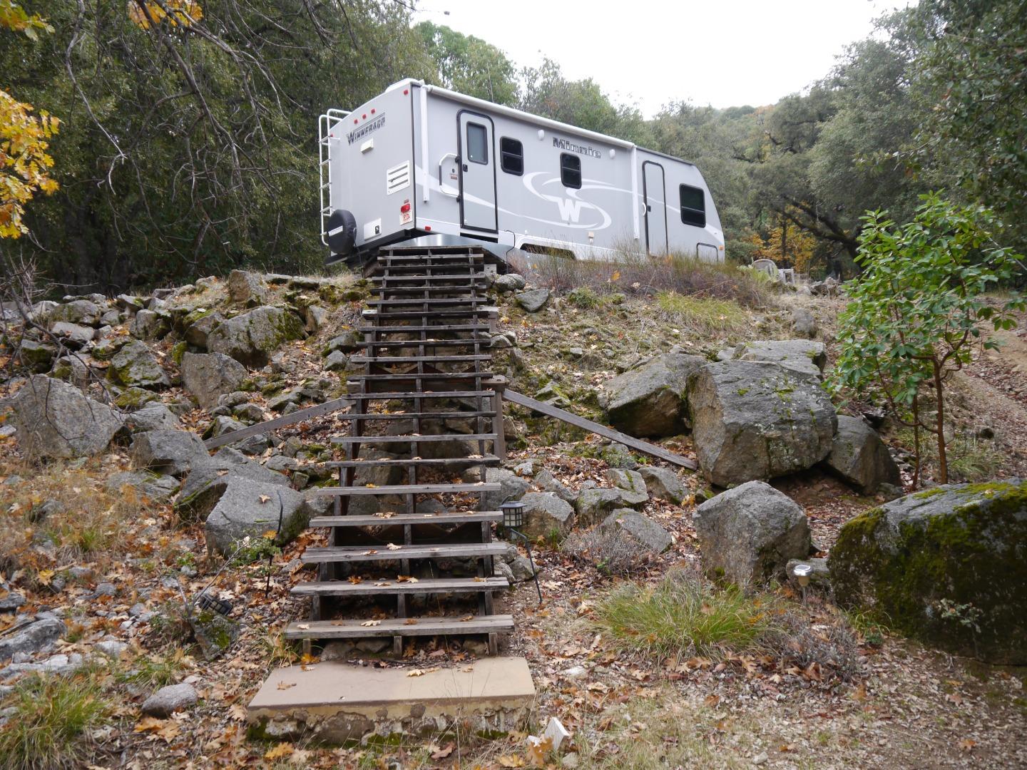 39450 Tassajara Road Carmel Valley, CA 93924 - Photo 47 of 61 a view of a yard with a house