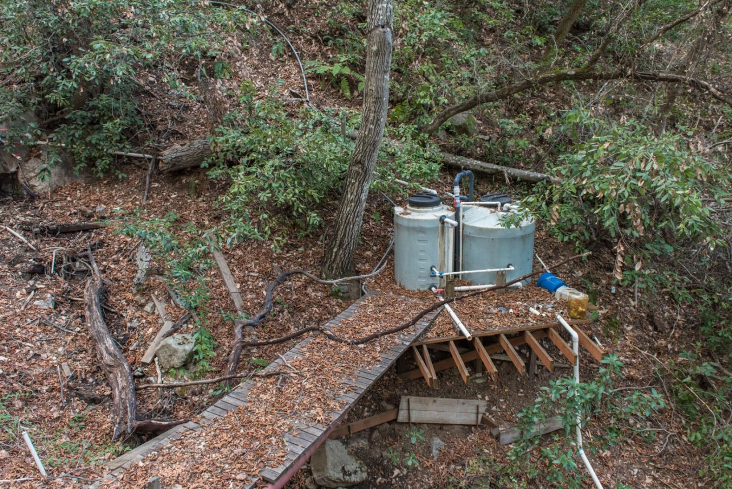 39450 Tassajara Road Carmel Valley, CA 93924 - Photo 54 of 61 a view of a house with a yard