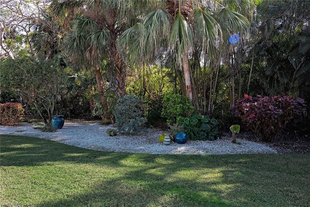 370 Rudder Road Naples, FL 34102 - Photo 17 of 26 a view of backyard with green space