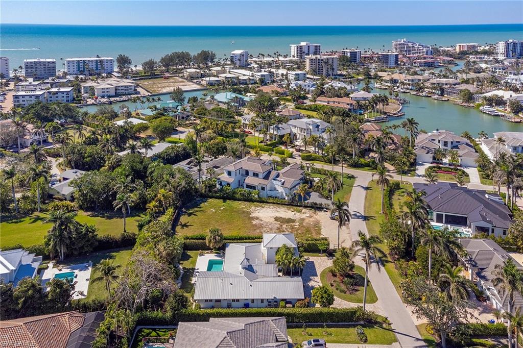 370 Rudder Road Naples, FL 34102 - Photo 23 of 26 an aerial view of residential houses with outdoor space