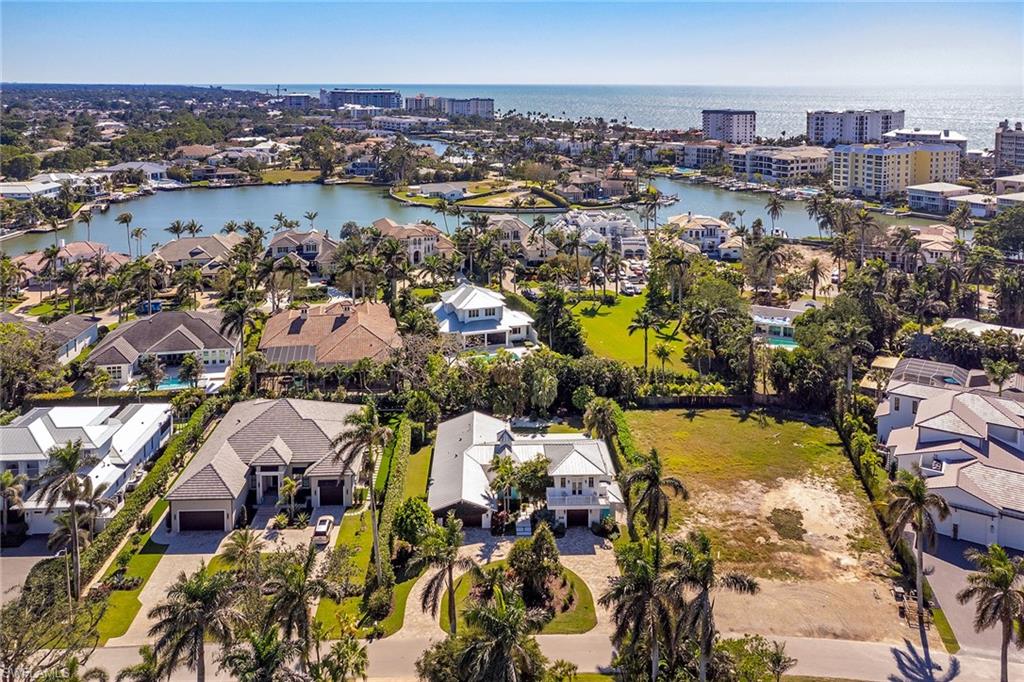 370 Rudder Road Naples, FL 34102 - Photo 25 of 26 an aerial view of residential houses with outdoor space