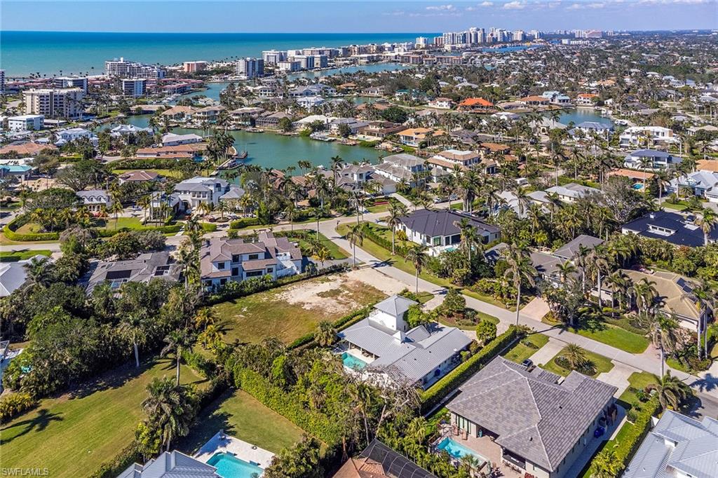 370 Rudder Road Naples, FL 34102 - Photo 26 of 26 an aerial view of residential houses with city view