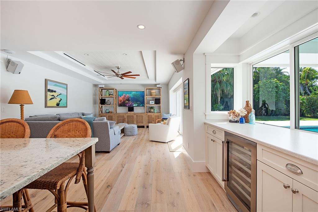 370 Rudder Road Naples, FL 34102 - Photo 8 of 26 a very nice looking living room with a large window